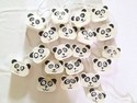 decorative and colored string lights - shape and material of fancy panda lanterns
